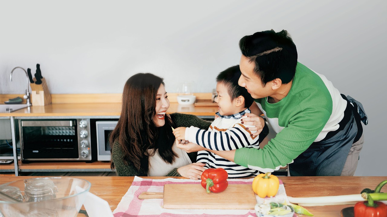 happy family eating in the kitchen