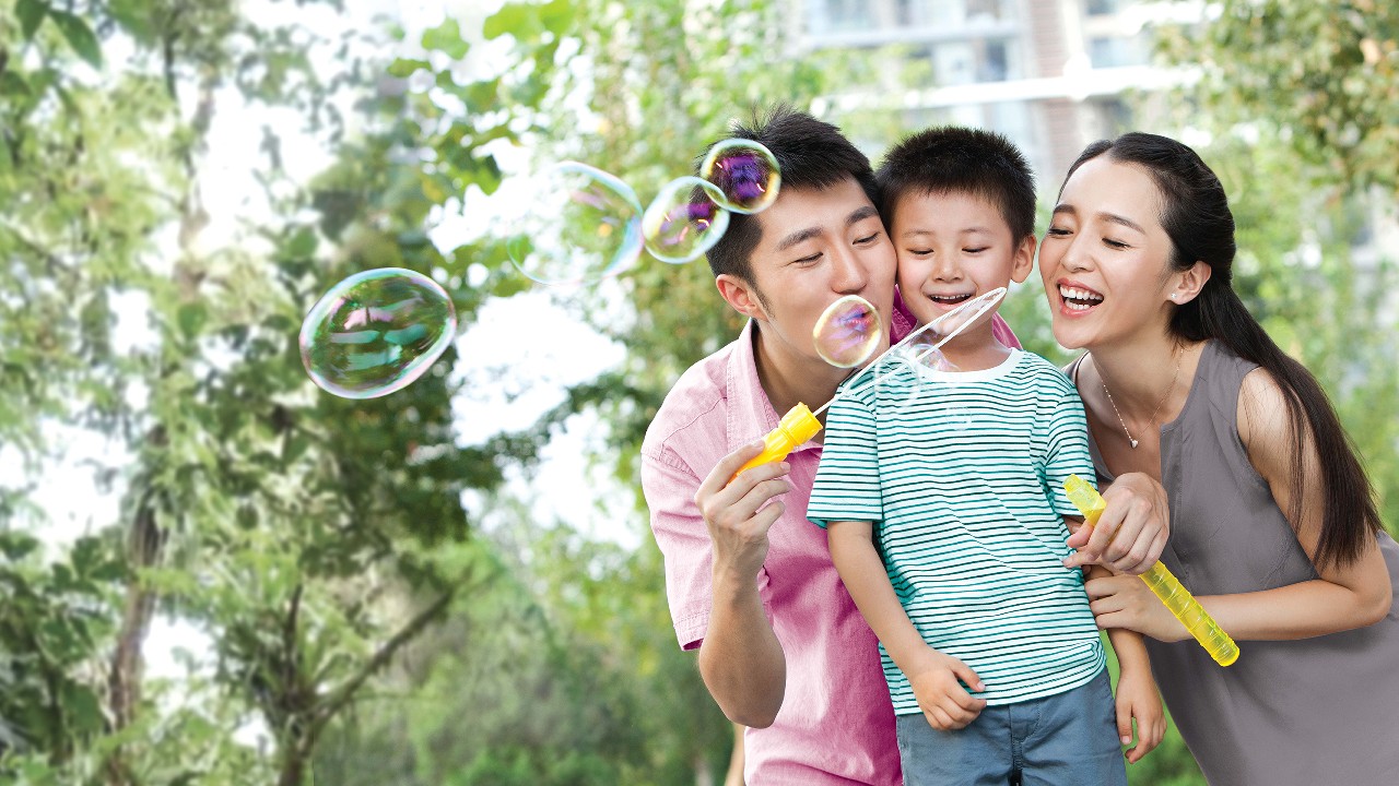 Family playing at park