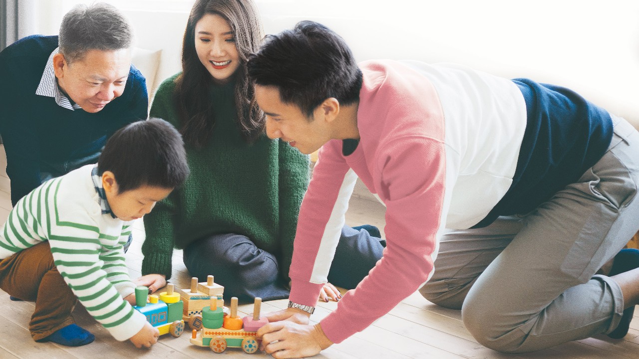 Family playing with kid